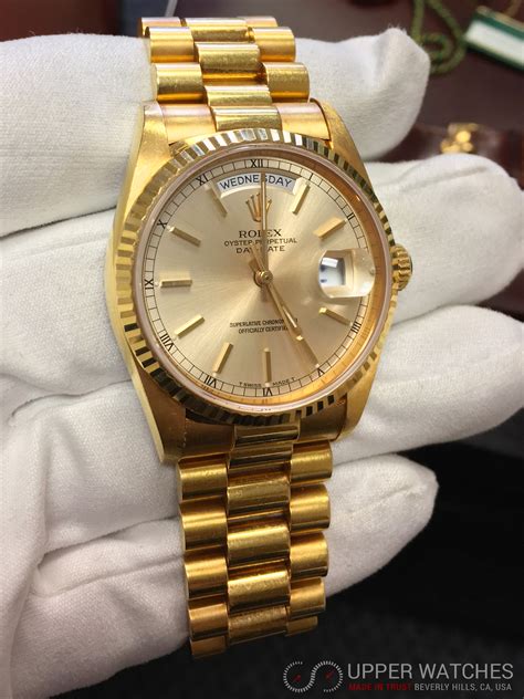 rolex presidential gold day date.